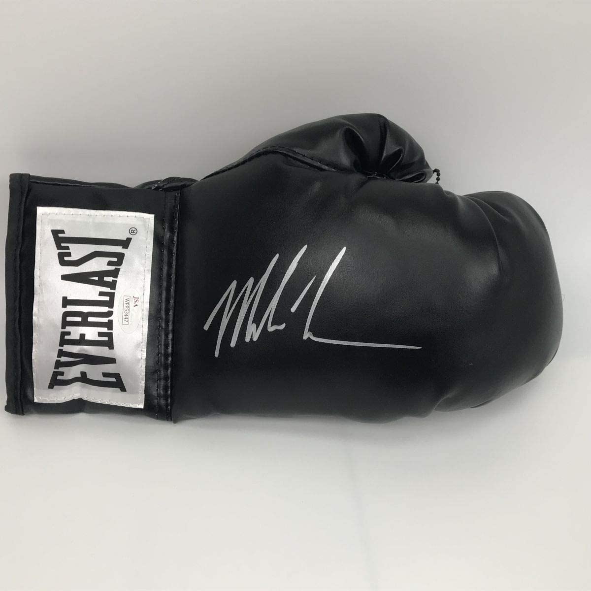 Autographed/Signed Mike Tyson Black Everlast Boxing Glove JSA COA