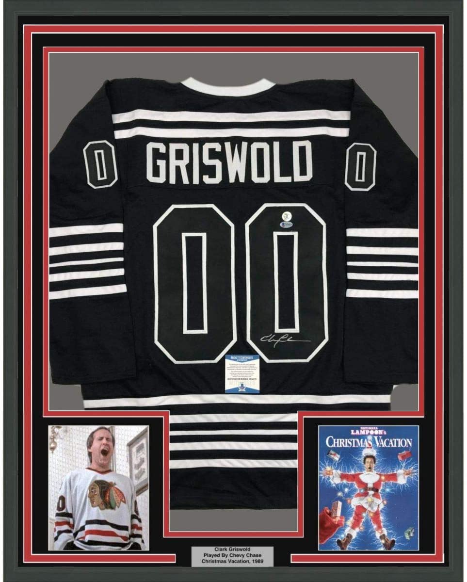 Framed Autographed/Signed Chevy Chase 35x39 Clark Griswold Christmas Vacation Movie Chicago Black Hockey Jersey Beckett BAS COA