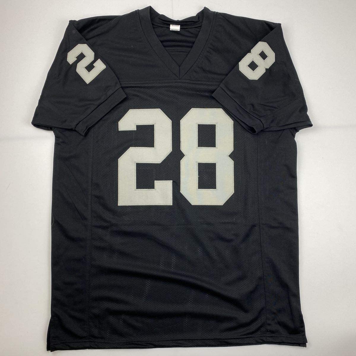 Autographed/Signed Josh Jacobs Just Win Baby Las Vegas Oakland Black Football Jersey Beckett BAS COA
