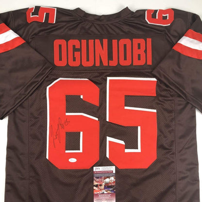 Autographed/Signed Larry Ogunjobi Cleveland Football Brown Jersey JSA COA