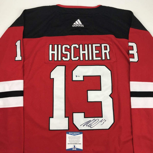 Autographed/Signed Nico Hischier New Jersey Red Hockey Jersey Beckett BAS COA