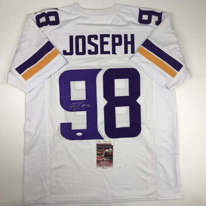 Autographed/Signed Linval Joseph Minnesota White Football Jersey JSA COA