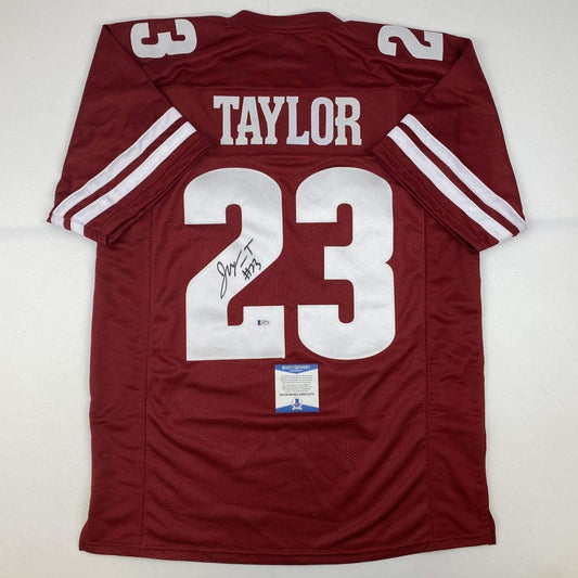 Autographed/Signed Jonathan Taylor Wisconsin Red College Football Jersey Beckett BAS COA