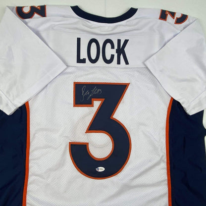 Autographed/Signed Drew Lock Denver White Football Jersey Beckett BAS COA