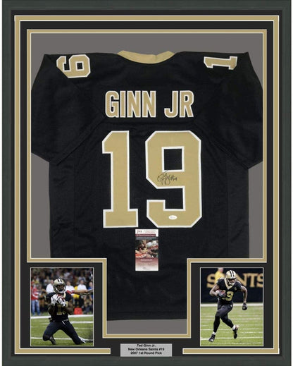 Framed Autographed/Signed Ted Ginn Jr. 35x39 New Orleans Black Football Jersey JSA COA
