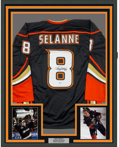 Framed Autographed/Signed Teemu Selanne 35x39 Anaheim Black Hockey Jersey Beckett BAS COA