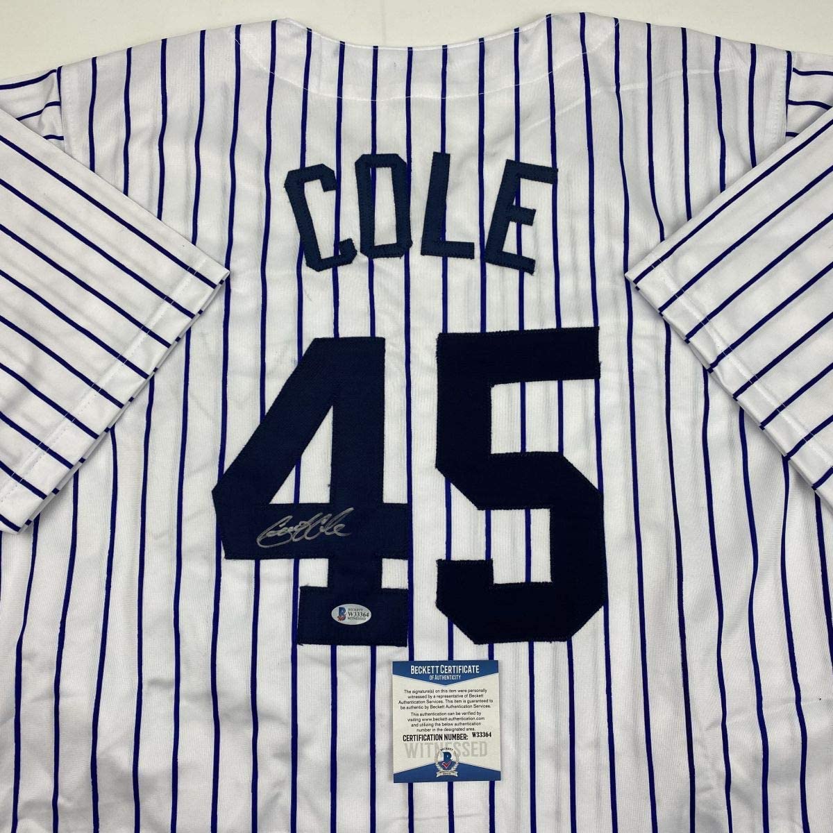 Autographed/Signed Gerrit Cole New York Pinstripe Baseball Jersey Beckett BAS COA