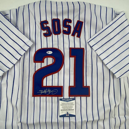 Autographed/Signed Sammy Sosa Chicago Pinstripe Baseball Jersey Beckett BAS COA