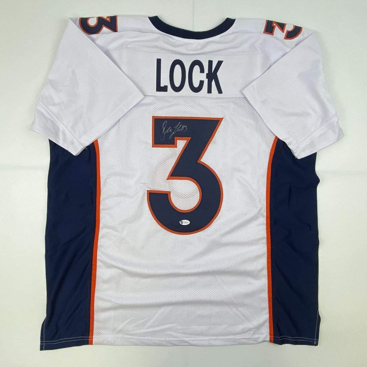 Autographed/Signed Drew Lock Denver White Football Jersey Beckett BAS COA