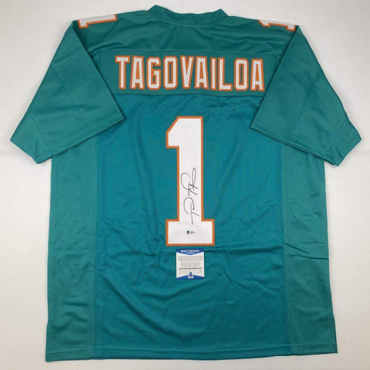 Autographed/Signed Tua Tagovailoa Miami Teal Football Jersey Beckett BAS COA