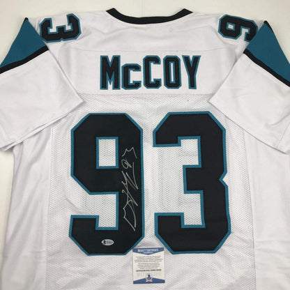 Autographed/Signed Gerald McCoy Carolina White Football Jersey Beckett BAS COA