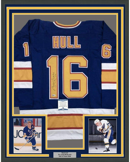 Framed Autographed/Signed Brett Hull 35x39 St. Louis Blue Hockey Jersey Beckett BAS COA