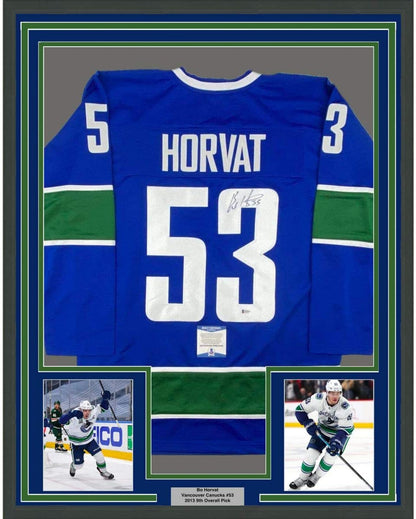Framed Autographed/Signed Bo Horvat 35x39 Vancouver Blue Hockey Jersey Beckett BAS COA