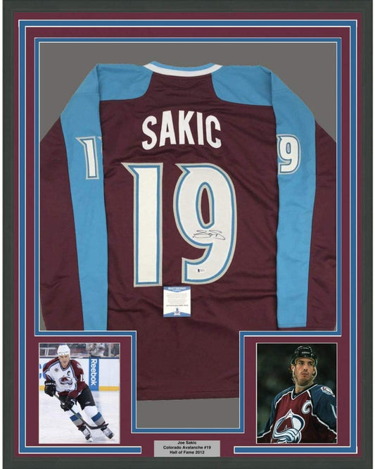 Framed Autographed/Signed Joe Sakic 35x39 Colorado Maroon Hockey Jersey Beckett BAS COA