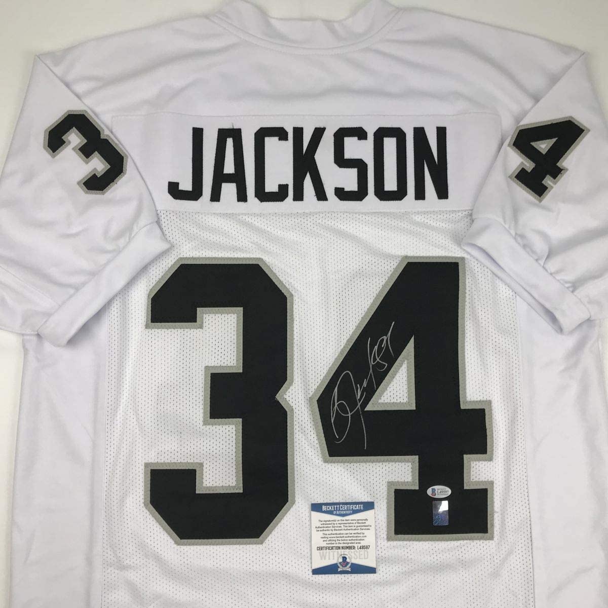 Autographed/Signed Bo Jackson Oakland White Football Jersey Beckett BAS COA