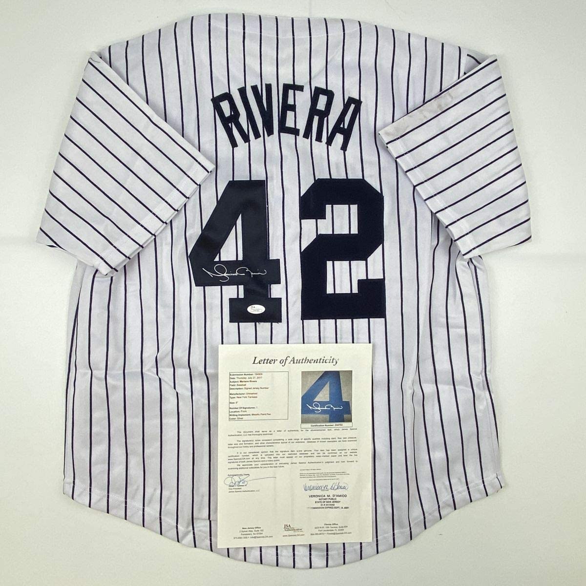 Autographed/Signed Mariano Rivera New York Pinstripe Baseball Jersey JSA COA/LOA