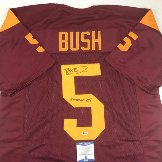 Autographed/Signed Reggie Bush 05 Heisman USC Southen Cal Maroon College Football Jersey Beckett BAS COA
