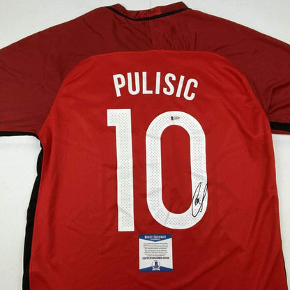 Autographed/Signed Christian Pulisic United States USA Red Soccer Jersey Beckett BAS COA