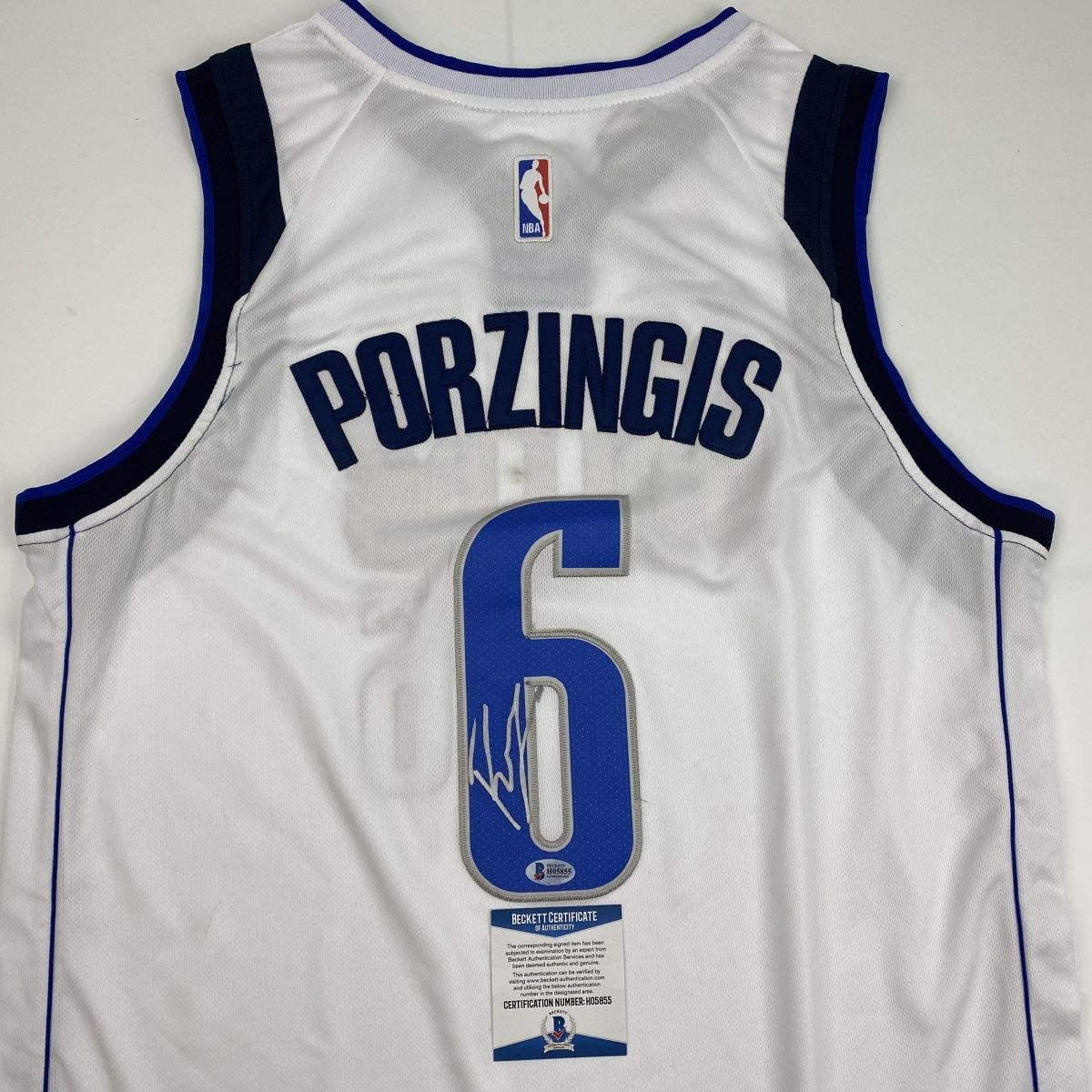 Autographed/Signed Kristaps Porzingis Dallas White Basketball Jersey Beckett BAS COA