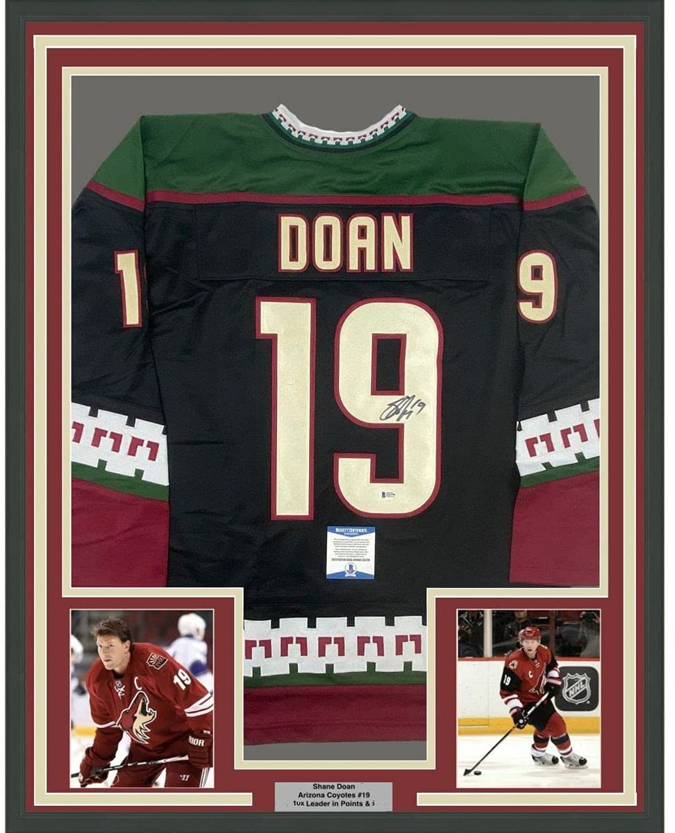 Framed Autographed/Signed Shane Doan 35x39 Arizona Black Hockey Jersey Beckett BAS COA
