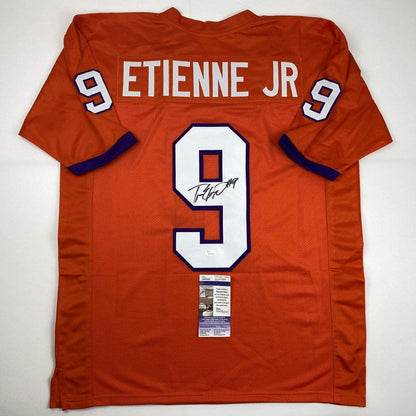 Autographed/Signed Travis Etienne Jr. Clemson Orange College Football Jersey JSA COA