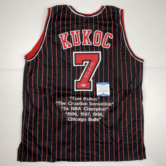 Autographed/Signed Toni Kukoc Chicago Black Pinstripe Stat Basketball Jersey Beckett BAS COA