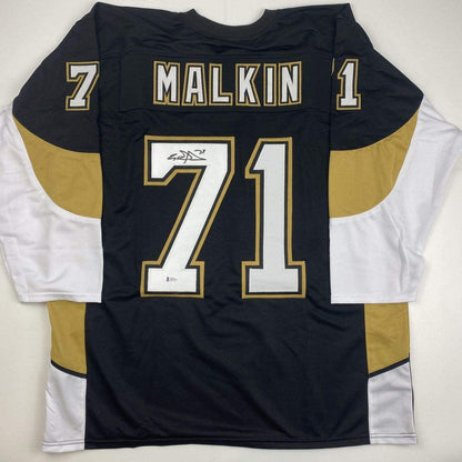 Autographed/Signed Evgeni Malkin Pittsburgh Black Hockey Jersey Beckett BAS COA