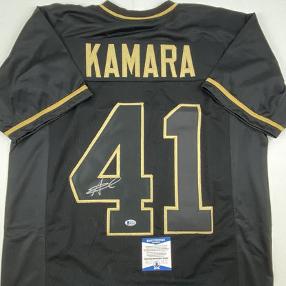 Autographed/Signed Alvin Kamara New Orleans Blackout Football Jersey Beckett BAS COA