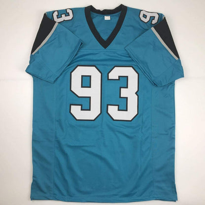 Autographed/Signed Gerald McCoy Carolina Blue Football Jersey JSA COA