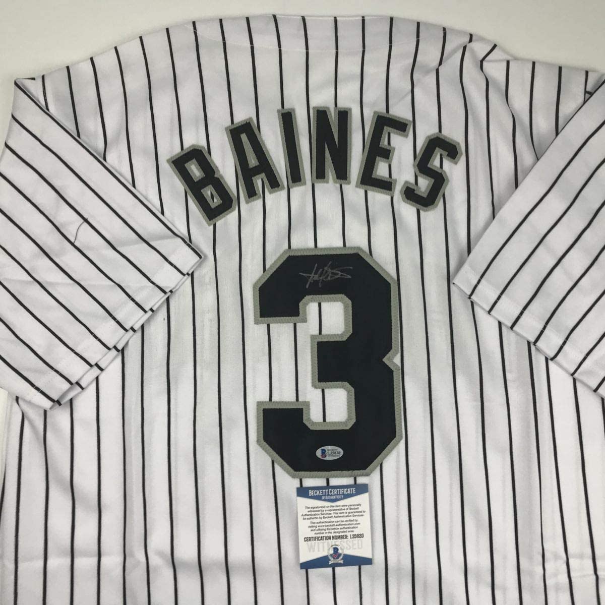 Autographed/Signed Harold Baines Chicago Pinstripe Baseball Jersey Beckett BAS COA