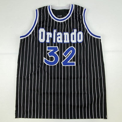 Autographed/Signed Shaquille Shaq O'Neal Orlando Black Pinstripe Basketball Jersey Beckett BAS COA