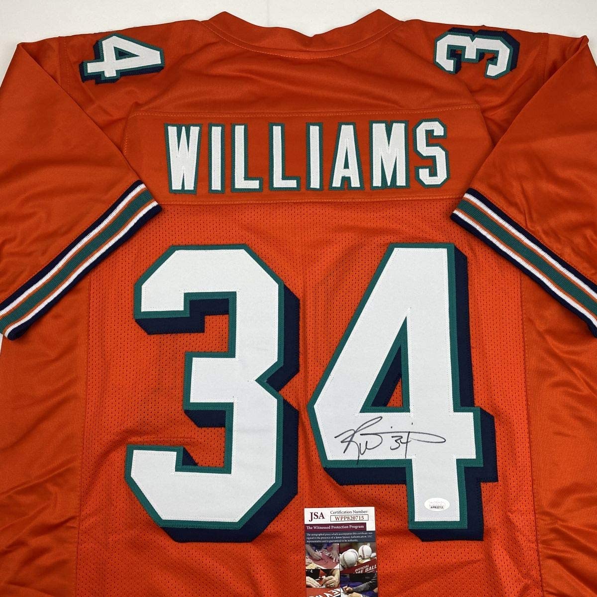 Autographed/Signed Ricky Williams Miami Orange Football Jersey JSA COA