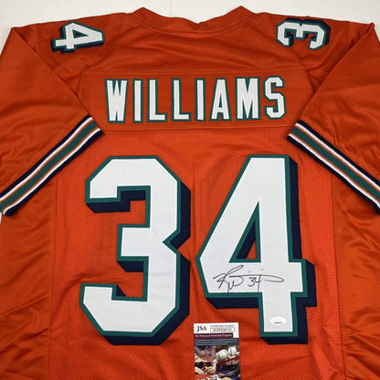 Autographed/Signed Ricky Williams Miami Orange Football Jersey JSA COA