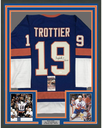Framed Autographed/Signed Bryan Trottier HOF 97 35x39 New York Blue Hockey Jersey JSA COA