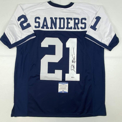 Autographed/Signed Deion Sanders Dallas Thanksgiving Day Football Jersey Beckett BAS COA
