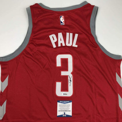 Autographed/Signed Chris Paul Houston Rockets Red Basketball Jersey Beckett BAS COA