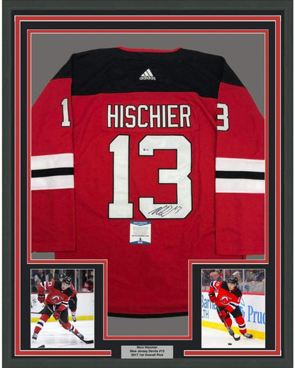 Framed Autographed/Signed Nico Hischier 35x39 New Jersey Red Hockey Jersey Beckett BAS COA