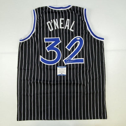 Autographed/Signed Shaquille Shaq O'Neal Orlando Black Pinstripe Basketball Jersey Beckett BAS COA