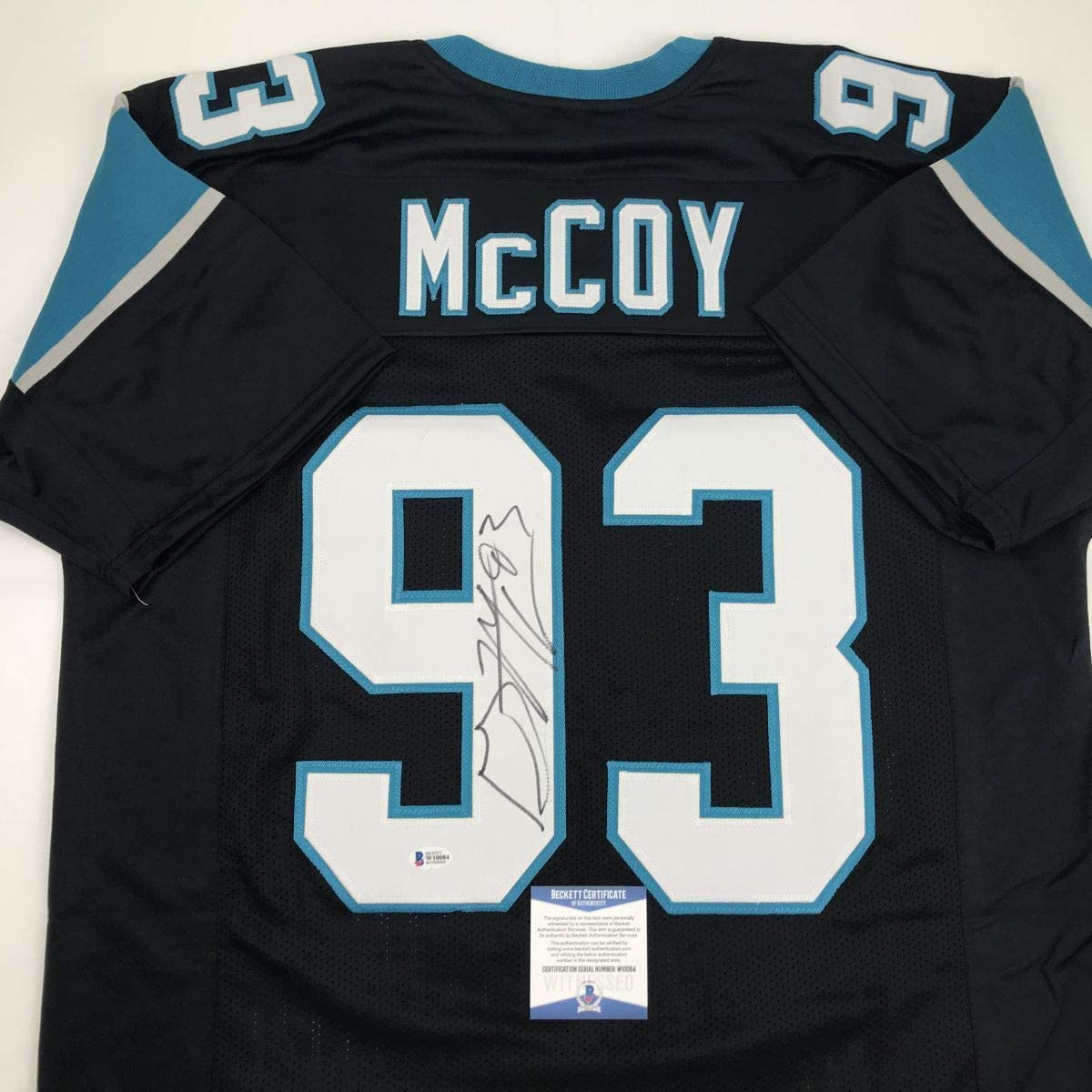 Autographed/Signed Gerald McCoy Carolina Black Football Jersey Beckett BAS COA
