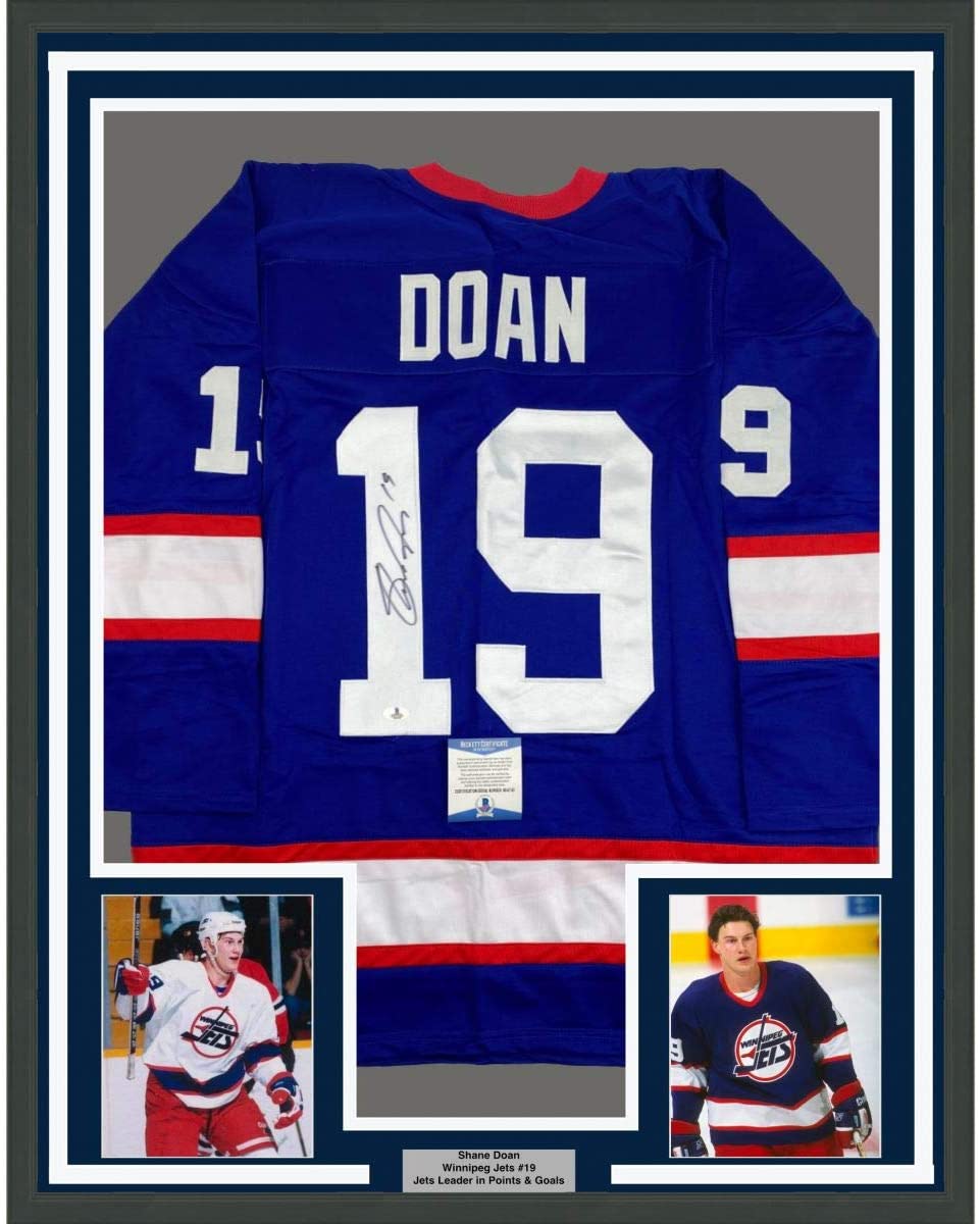 Framed Autographed/Signed Shane Doan 35x39 Winnipeg Blue Hockey Jersey Beckett BAS COA