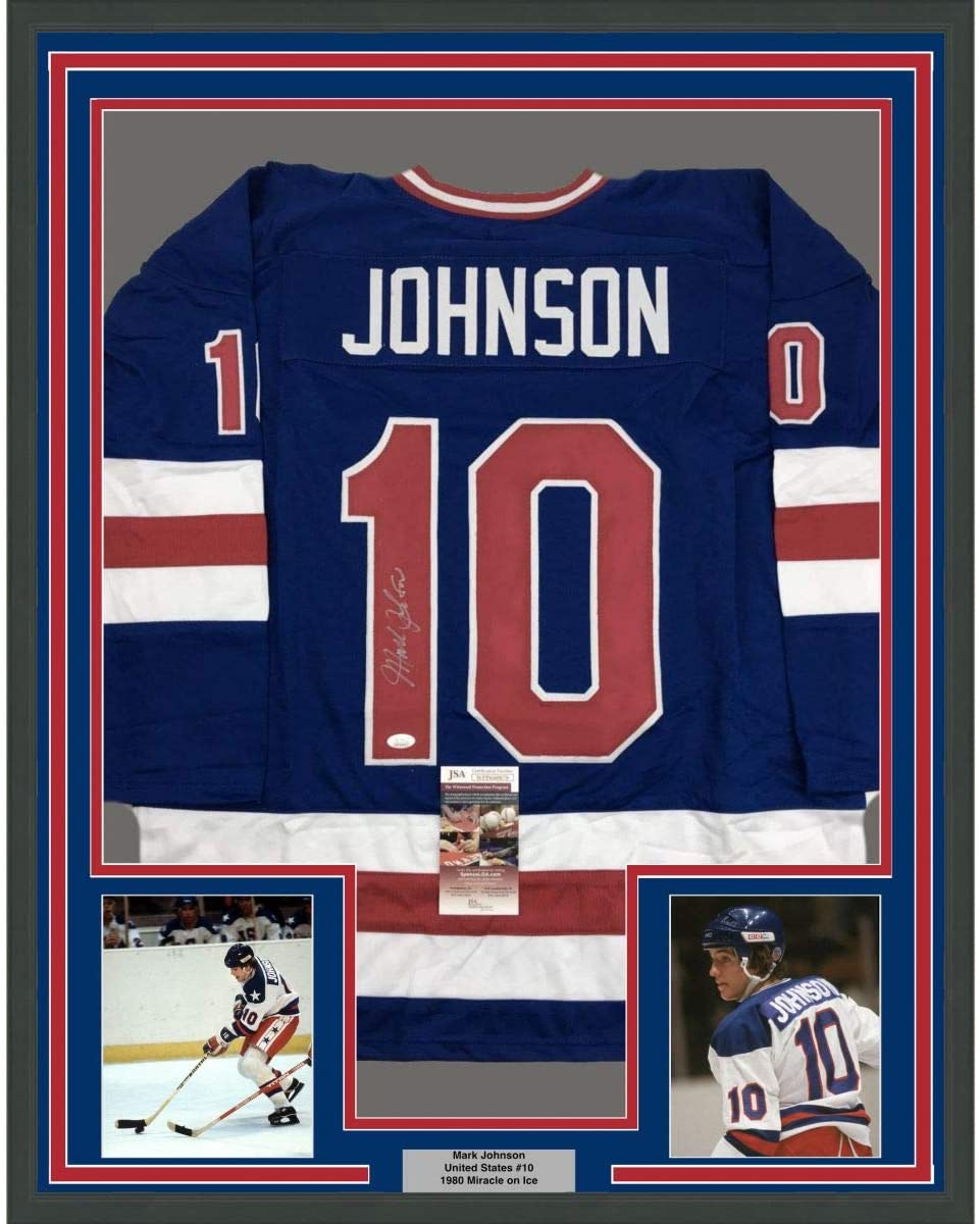 Framed Autographed/Signed Mark Johnson 35x39 Blue Team USA Miracle On Ice 1980 Olympics Hockey Jersey JSA COA