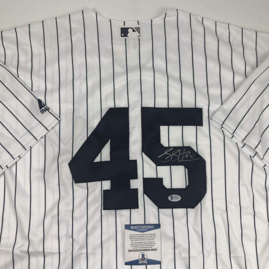 Autographed/Signed Luke Voit New York Pinstripe Baseball Jersey Beckett BAS COA