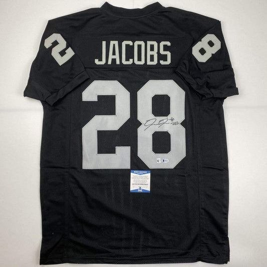 Autographed/Signed Josh Jacobs Las Vegas Oakland Black Football Jersey Beckett BAS COA