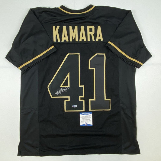Autographed/Signed Alvin Kamara New Orleans Blackout Football Jersey Beckett BAS COA