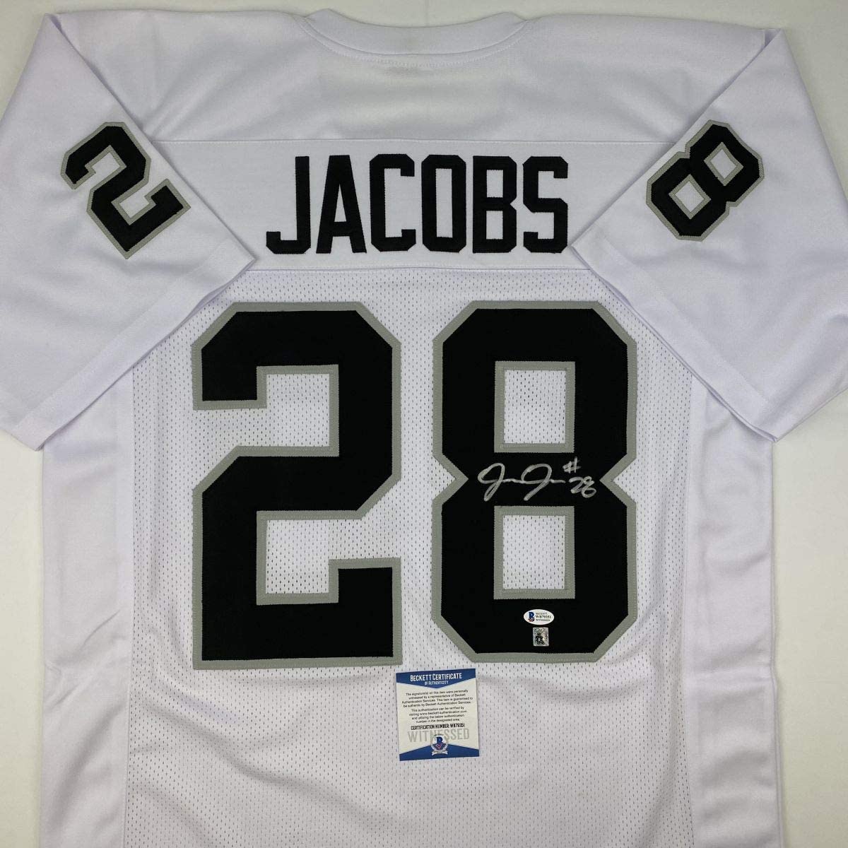 Autographed/Signed Josh Jacobs Las Vegas Oakland White Football Jersey Beckett BAS COA