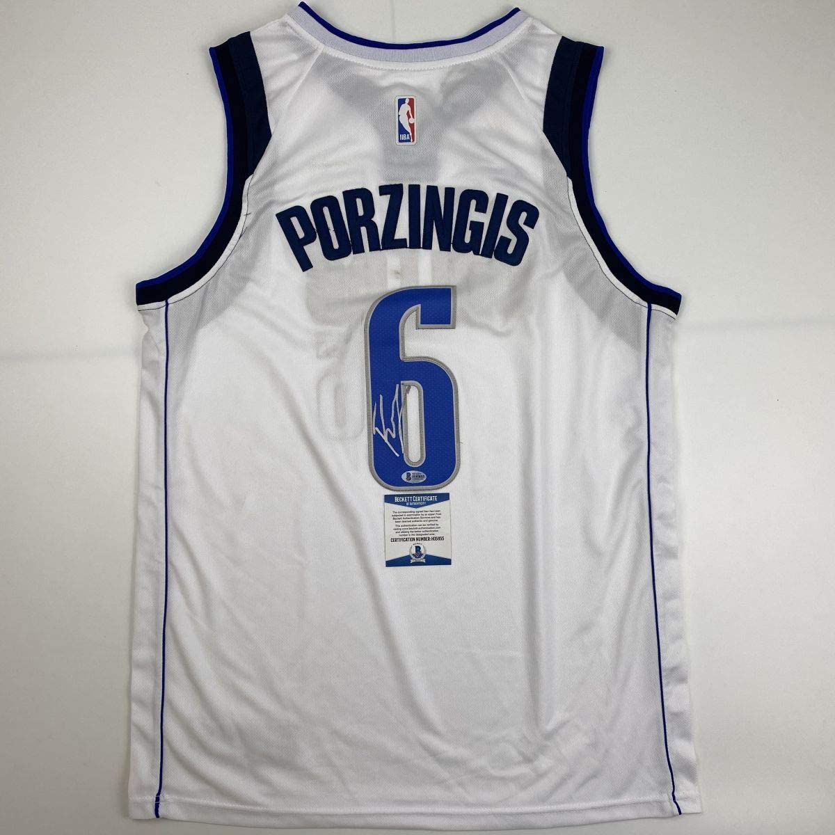 Autographed/Signed Kristaps Porzingis Dallas White Basketball Jersey Beckett BAS COA