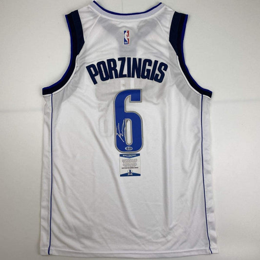 Autographed/Signed Kristaps Porzingis Dallas White Basketball Jersey Beckett BAS COA