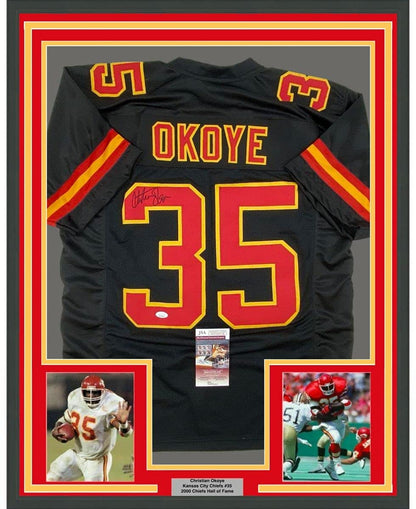 Framed Autographed/Signed Christian Okoye 35x39 Kansas City Black Football Jersey JSA COA