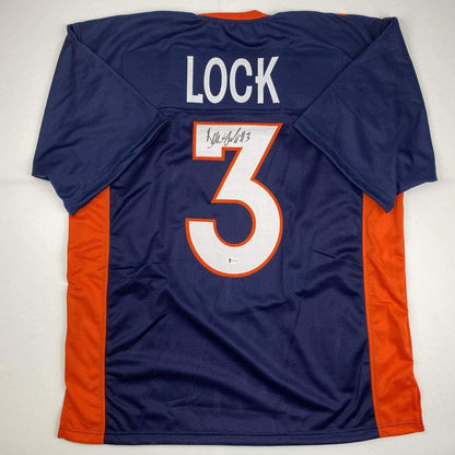 Autographed/Signed Drew Lock Denver Blue Football Jersey Beckett BAS COA