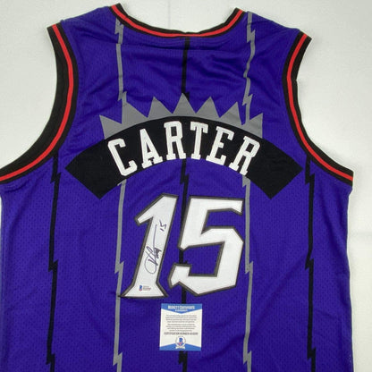 Autographed/Signed Vince Carter Toronto Raptors Purple Basketball Jersey Beckett BAS COA